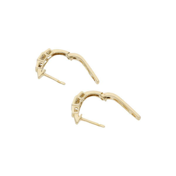 Aretes diseño especial con diamantes en oro amarillo 14 kilates.