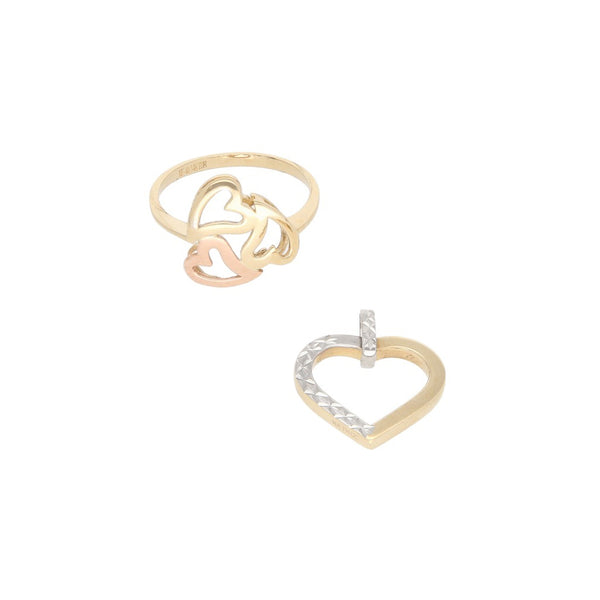 Juego de anillo y dije calados motivo corazón en oro amarillo 14 kilates.