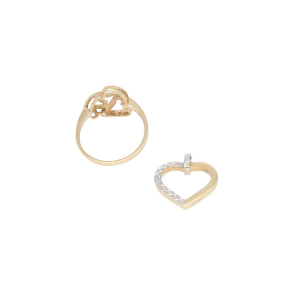 Juego de anillo y dije calados motivo corazón en oro amarillo 14 kilates.