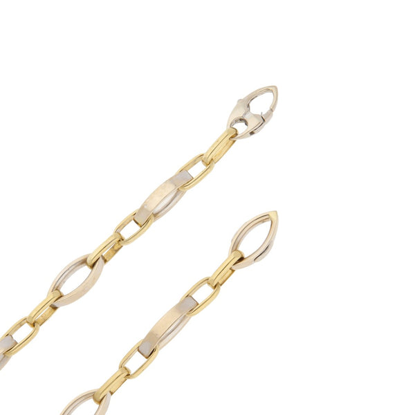 Collar eslabón cruzado en oro dos tonos 18 kilates.