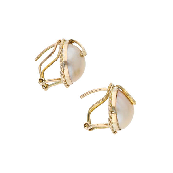Aretes diseño especial con perlas en oro amarillo 12 kilates.