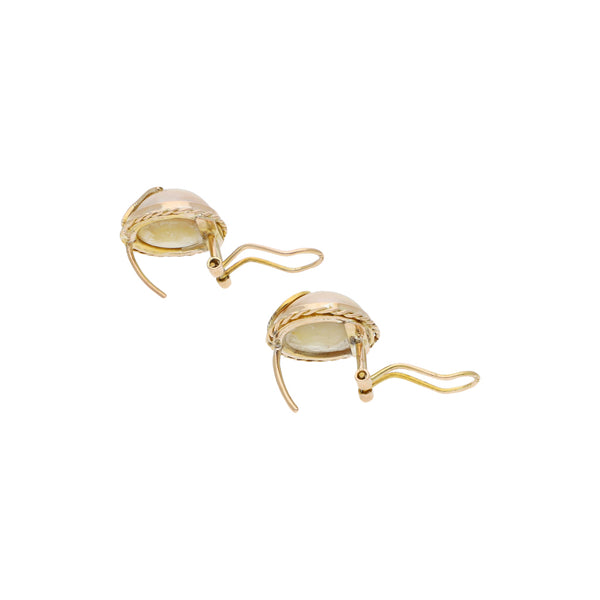 Aretes diseño especial con perlas en oro amarillo 12 kilates.