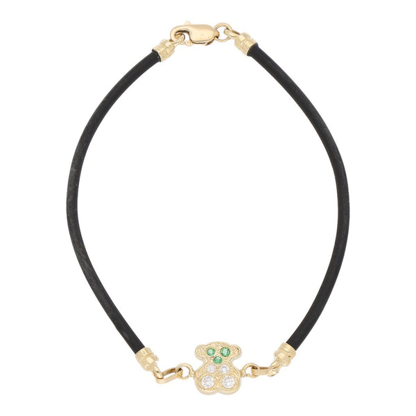 Pulsera de caucho con aplicación motivo oso de sintéticos y casquillos en oro amarillo 14 kilates.