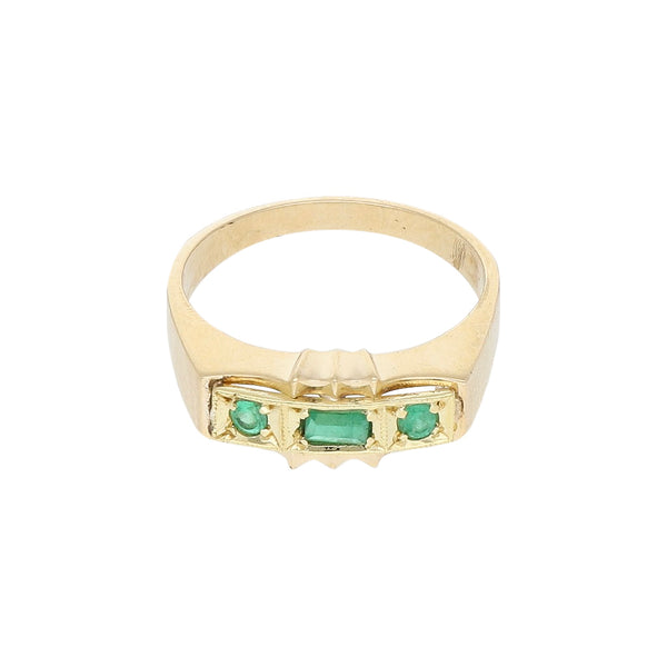 Anillo diseño especial con esmeraldas en oro amarillo 14 kilates.