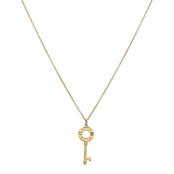 Gargantilla eslabón cruzado y dije motivo llave con diamantes firma Tiffany & Co. en oro amarillo 18 kilates.