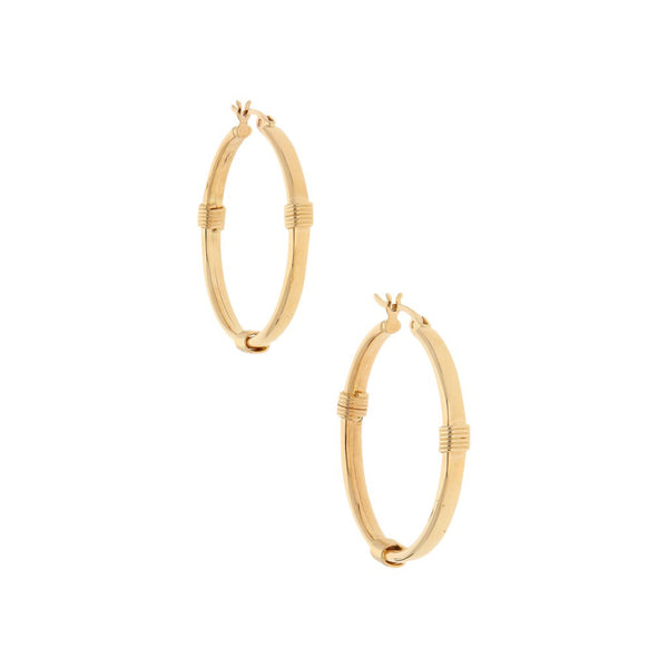 Arracadas huecas en oro amarillo 14 kilates.