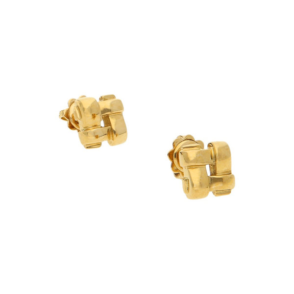 Broqueles estilizados firma Tiffany & Co. en oro amarillo 18 kilates.