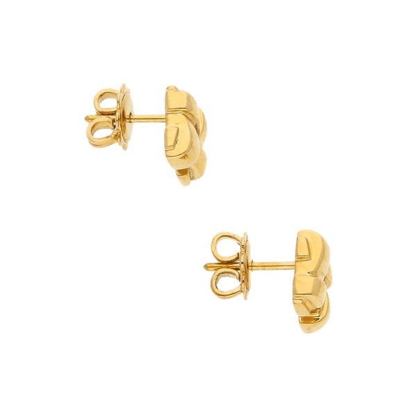 Broqueles estilizados firma Tiffany & Co. en oro amarillo 18 kilates.