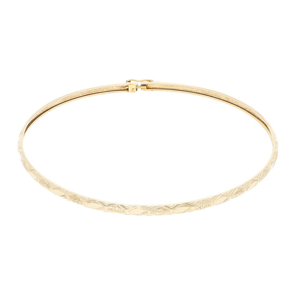 Pulsera de arillo facetada en oro amarillo 12 kilates.