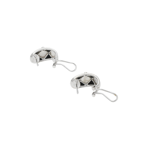 Aretes diseño especial con diamantes y gemas en oro blanco 14 kilates.