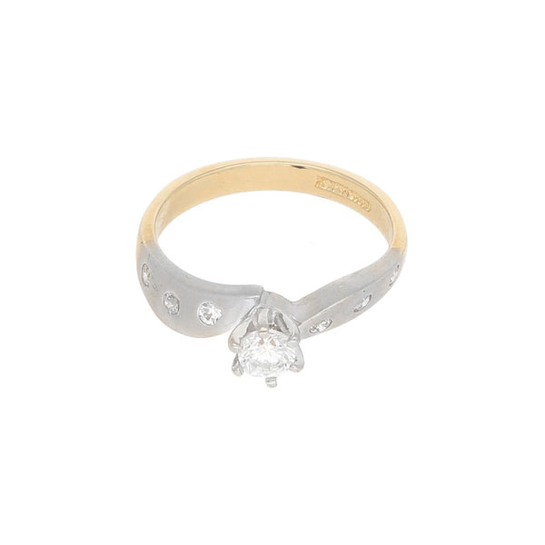 Anillo de compromiso con circonias en oro amarillo 14 kilates.