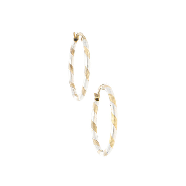 Arracadas torzales platinadas en oro amarillo 14 kilates.