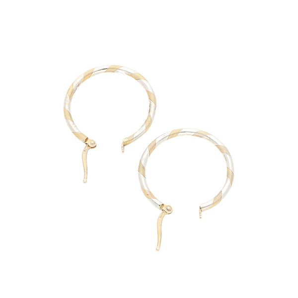 Arracadas torzales platinadas en oro amarillo 14 kilates.
