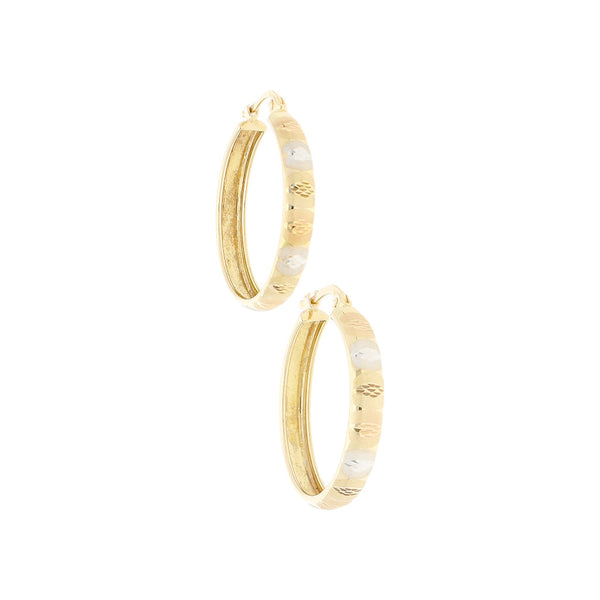 Arracadas labradas en oro amarillo 14 kilates.