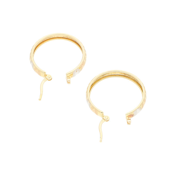 Arracadas labradas en oro amarillo 14 kilates.