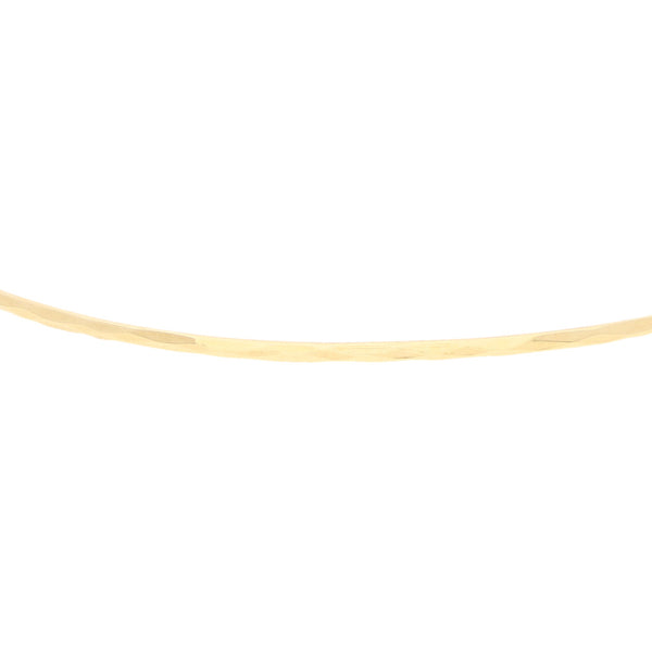 Pulsera de arillo facetada en oro amarillo 14 kilates.