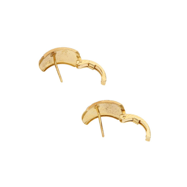 Aretes labrados en oro amarillo 14 kilates.