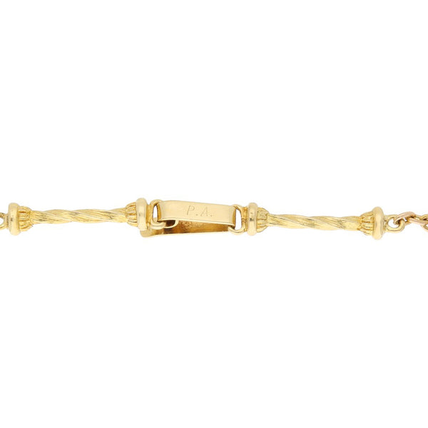 Pulsera eslabón combinado en oro amarillo 18 kilates.