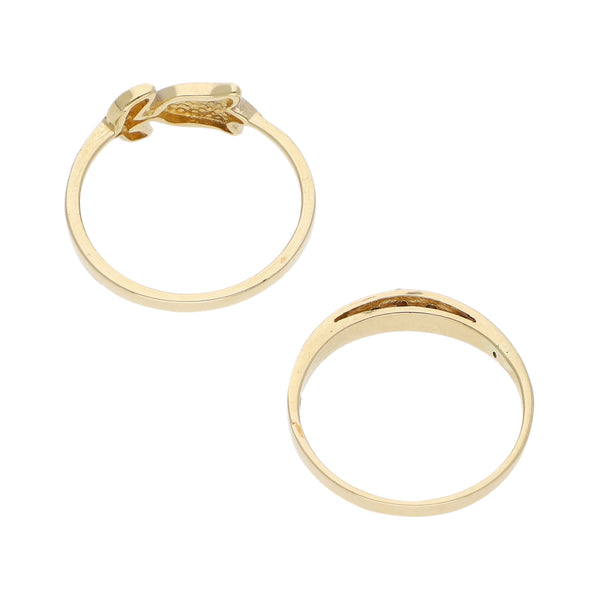 Dos anillos diseño especial motivo flor y circonias en oro amarillo 14 kilates.