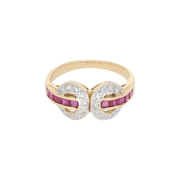 Anillo diseño especial con diamante y rubíes en oro amarillo 14 kilates.