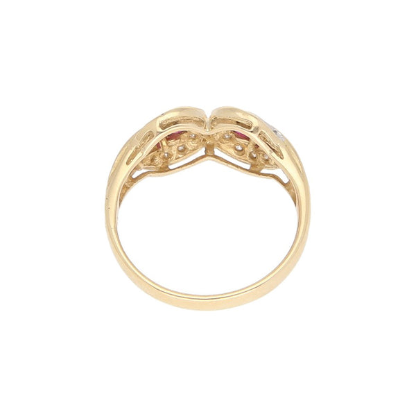 Anillo diseño especial con diamante y rubíes en oro amarillo 14 kilates.