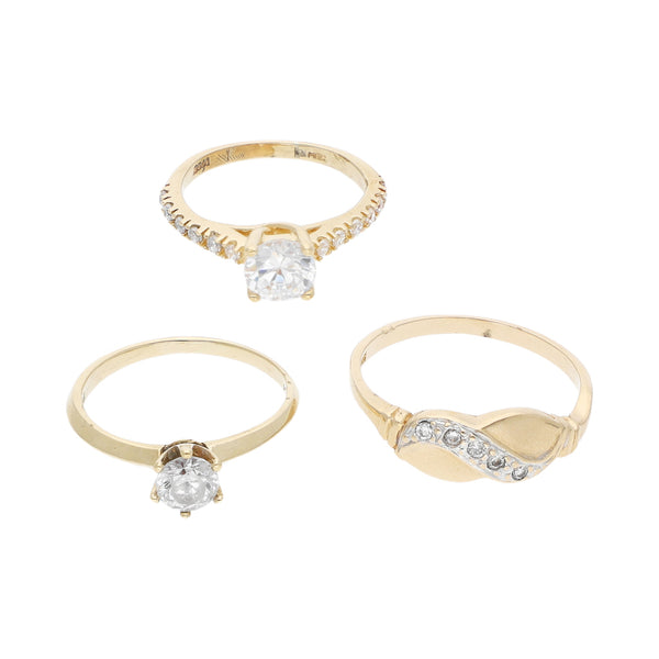 Tres anillos diseño especial con circonias en oro amarillo 14 kilates.