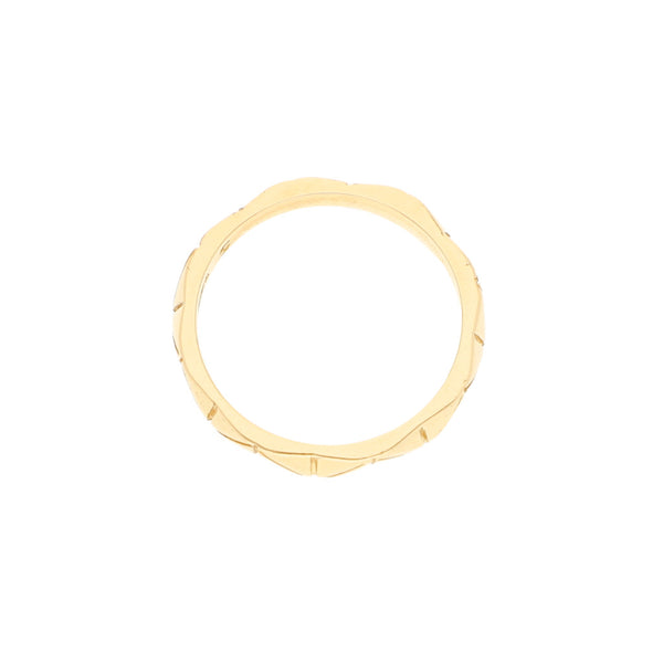 Argolla facetada firma Tane en oro amarillo 18 kilates.