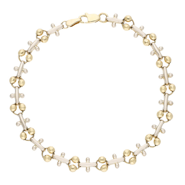 Pulsera eslabón combinado en oro dos tonos 14 kilates.