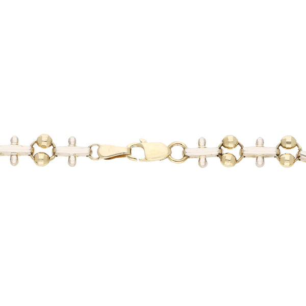 Pulsera eslabón combinado en oro dos tonos 14 kilates.