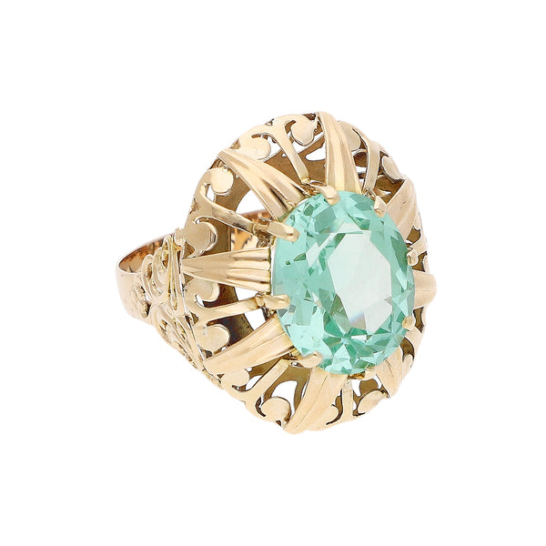 Anillo calado con sintético en oro amarillo 14 kilates.