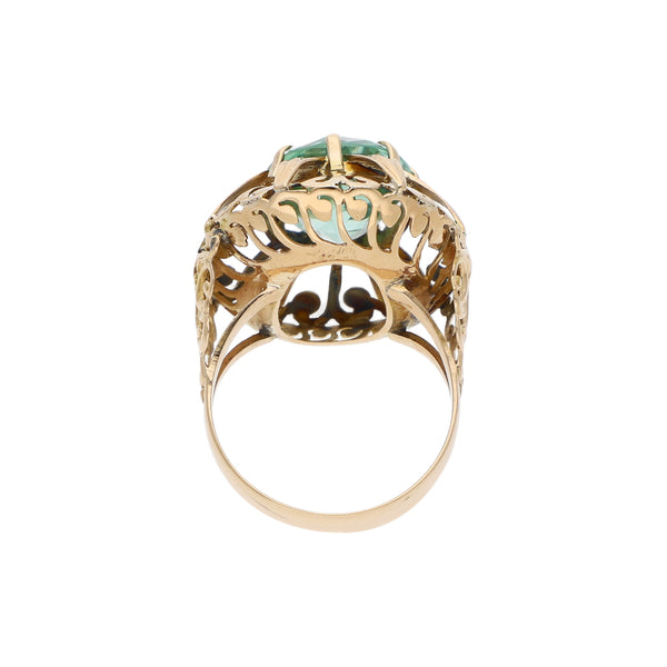 Anillo calado con sintético en oro amarillo 14 kilates.