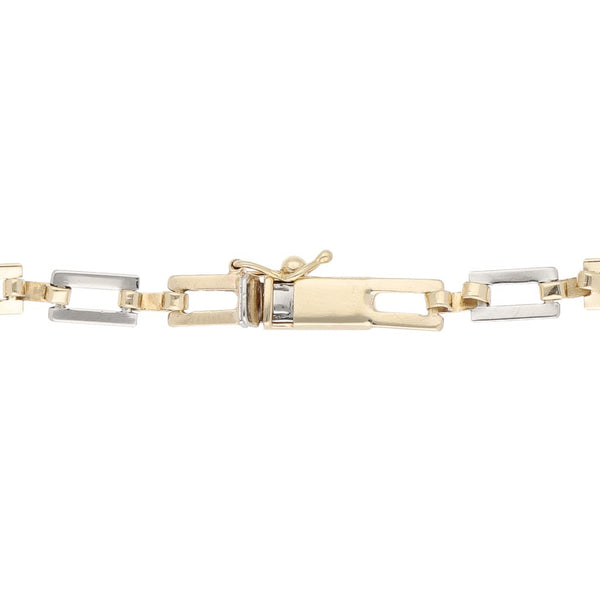 Pulsera eslabón articulado en oro tres tonos 14 kilates.
