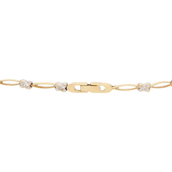 Pulsera eslabón articulado con circonias en oro dos tonos 14 kilates.