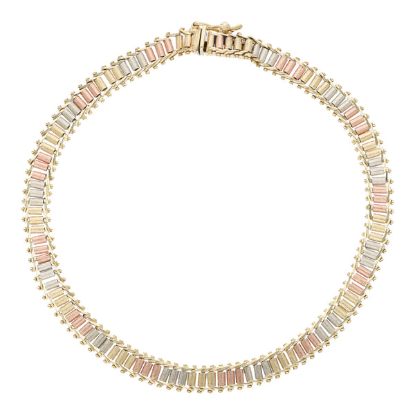 Pulsera eslabón boleado en oro tres tonos 14 kilates.