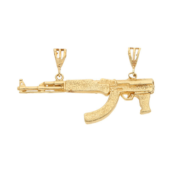 Dije diseño especial motivo fusil en oro amarillo 12 kilates.
