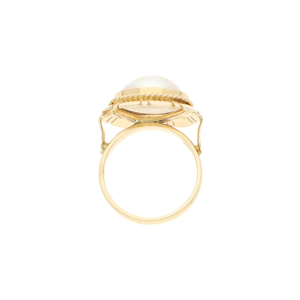 Anillo diseño especial con perla en oro amarillo 14 kilates.