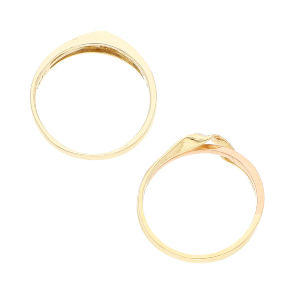Dos anillos diseño especial con circonias en oro dos tonos 14 kilates.