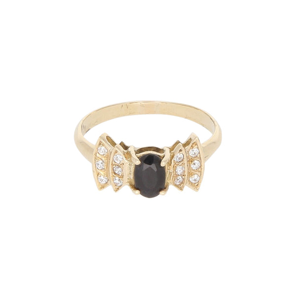 Anillo diseño especial con sintéticos en oro amarillo 14 kilates.