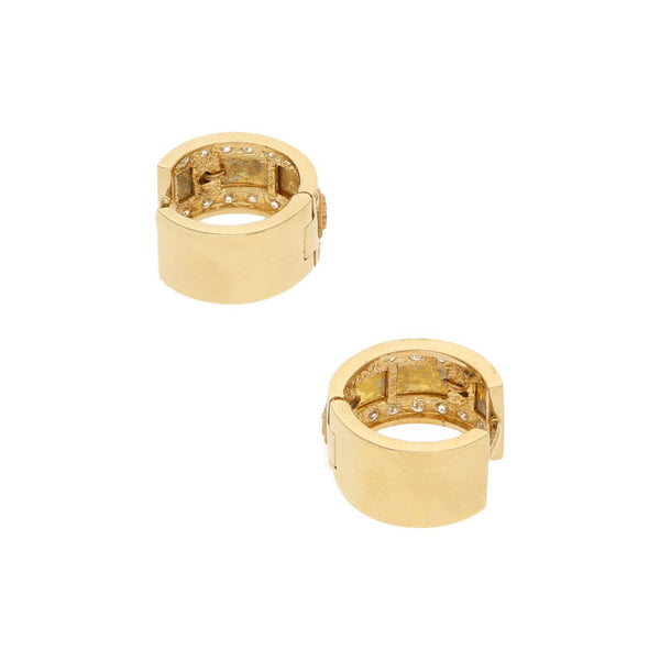 Arracadas articuladas con aplicaciones y circonias motivo números romanos en oro amarillo 14 kilates.