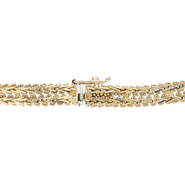 Pulsera de dos hilos eslabón boleado con aplicación y moneda de dos pesos oro mexicano 21.6 kilates en oro tres tonos 14 kilates.