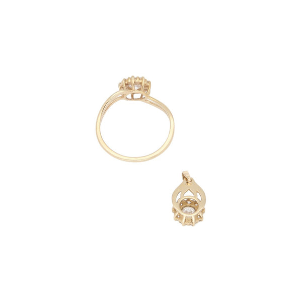 Juego de Anillo y dije diseño especial con sintéticos motivo flor en oro amarillo 14 kilates.