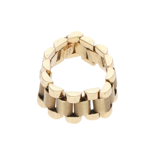 Argolla articulada con aplicación motivo corona en oro amarillo 14 kilates.