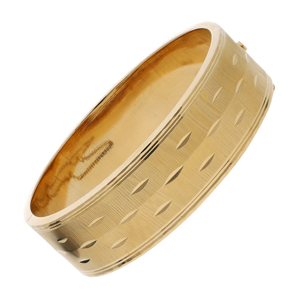 Pulsera de arillo facetada en oro amarillo 18 kilates.