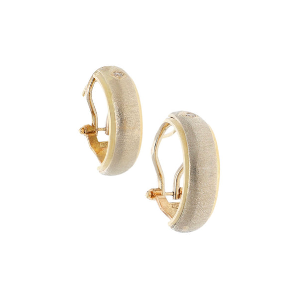 Aretes satinados con circonias en oro dos tonos 14 kilates.