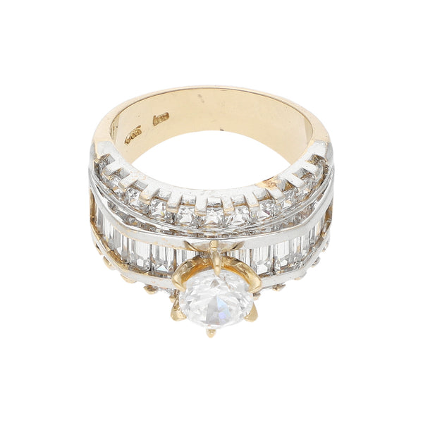 Anillo diseño especial con sintéticos en oro amarillo 14 kilates.