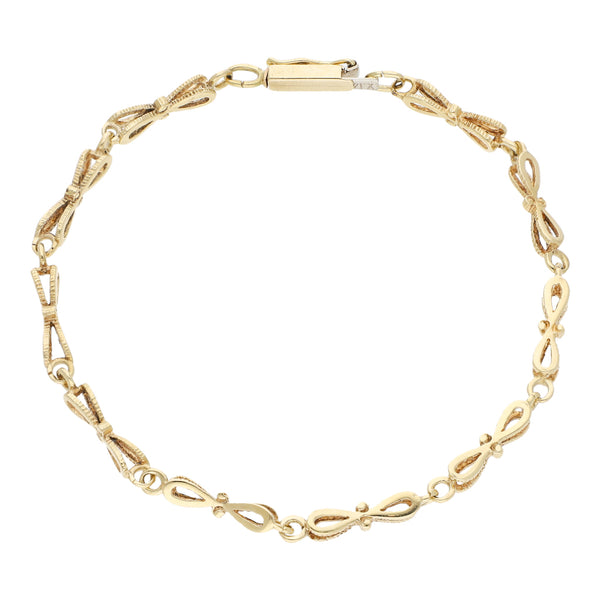Pulsera eslabón articulado en oro amarillo 14 kilates.