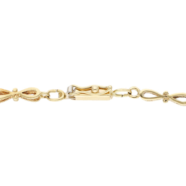 Pulsera eslabón articulado en oro amarillo 14 kilates.