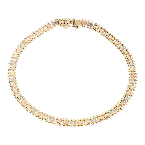 Pulsera eslabón boleado en oro tres tonos 14 kilates.