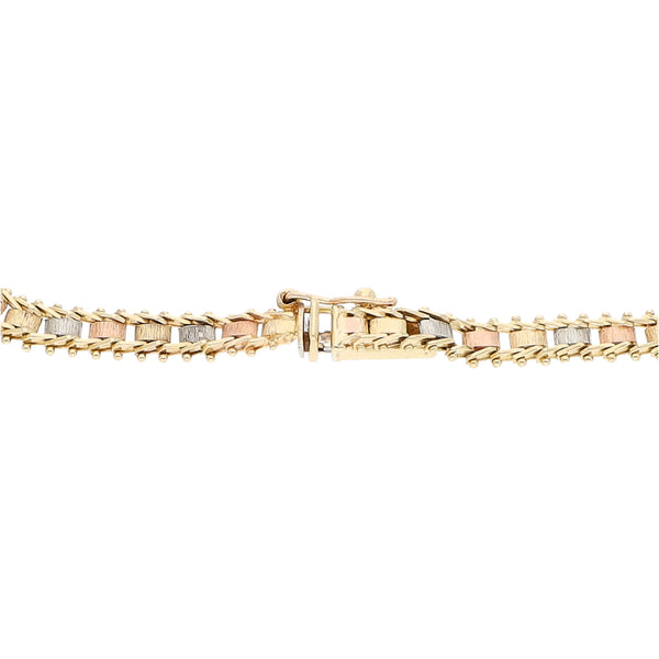 Pulsera eslabón boleado en oro tres tonos 14 kilates.