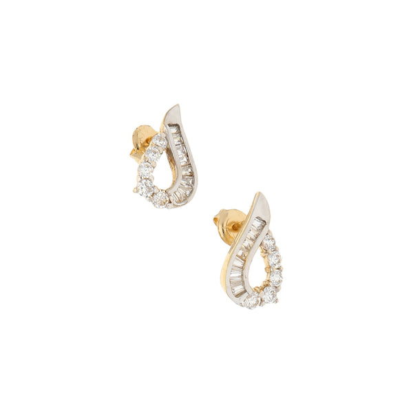 Broqueles diseño especial con circonias en oro amarillo 14 kilates.